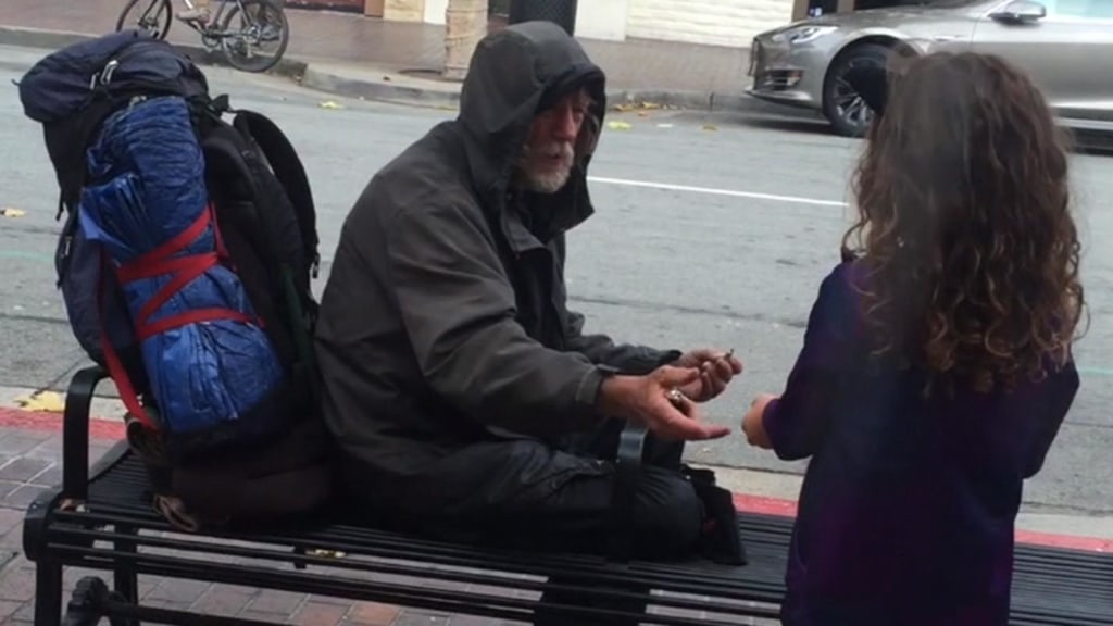Watch how one 8-year-old girl made a homeless man's week