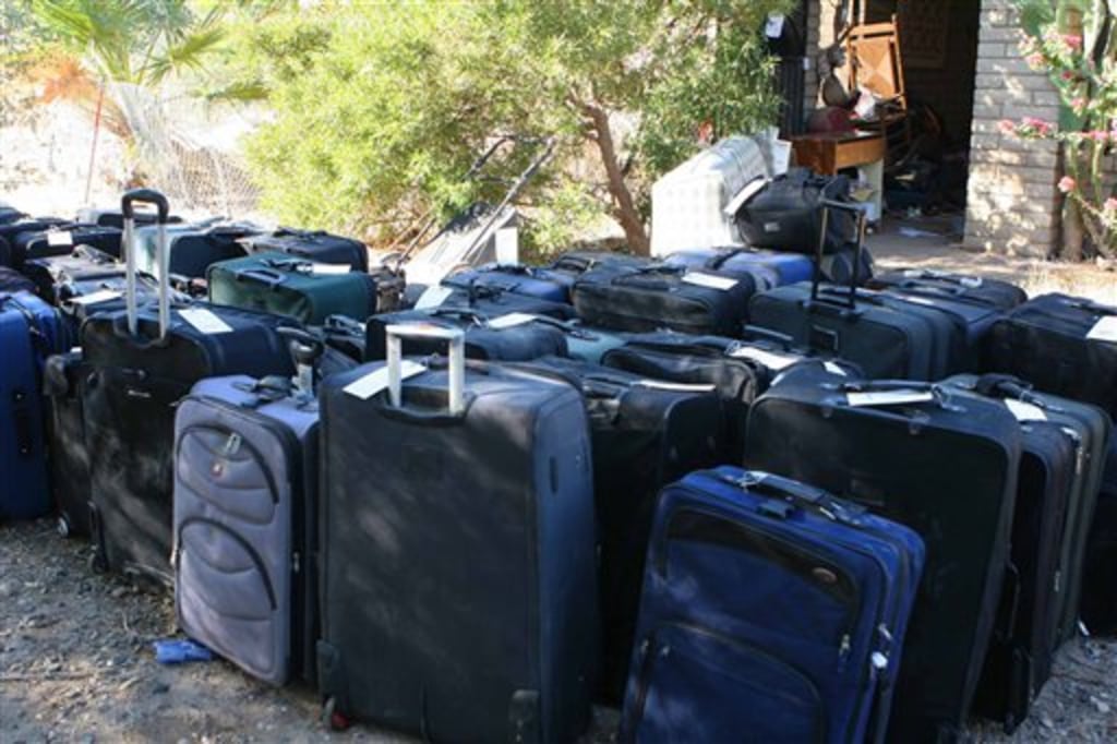 Dude got both heavy bags through PHX TSA so he could gate check them for  free. Legend : r/delta