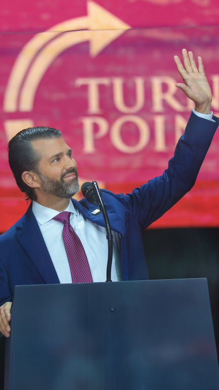 Donald Trump Jr. jokes at Kirk memorial