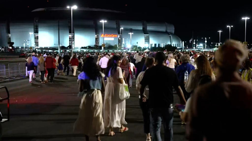 Attendees gather outside hours before Charlie Kirk’s memorial begins
