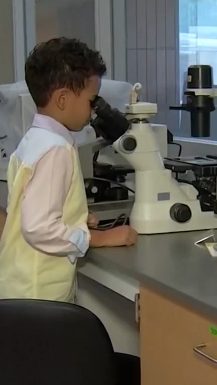 Nine-year-old boy attends first day of college