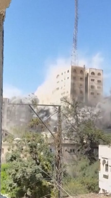 Israeli forces bomb high-rise building in Gaza City