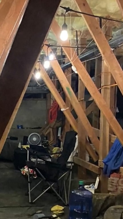 Police find man secretly lived in condo crawl space