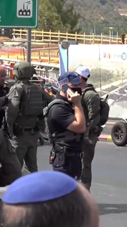 Gunmen kill at least five people at Jerusalem bus stop