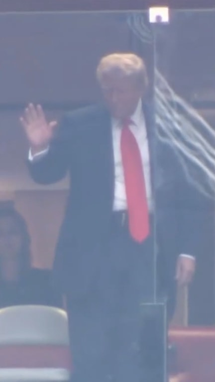 Trump appears behind bulletproof glass at Kirk memorial