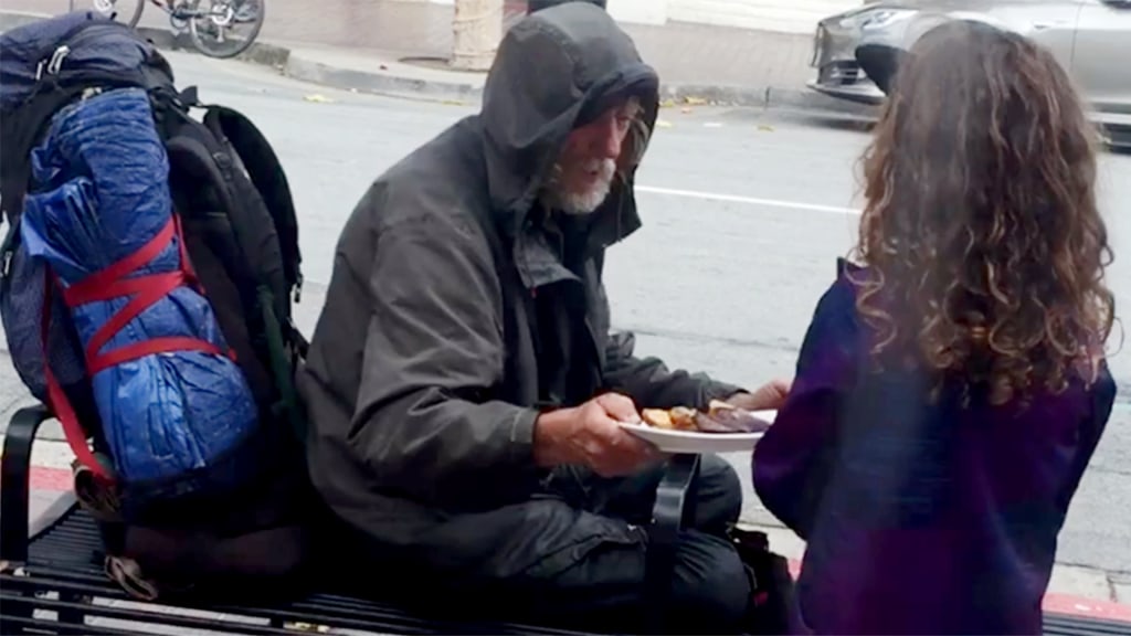 8-year-old girl gives her meal to homeless man and receives extraordinary  call days later