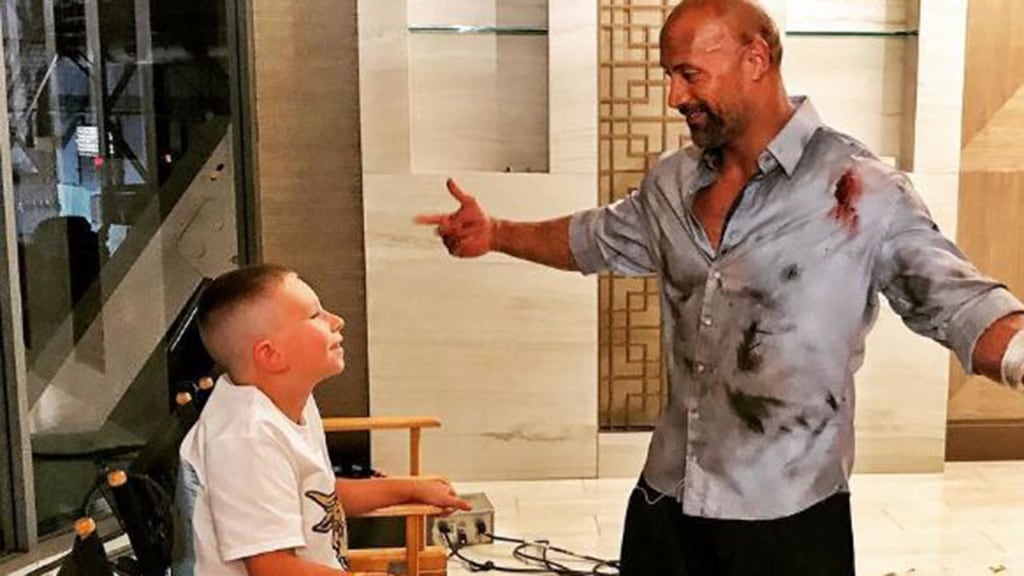 The Rock meets, hugs metro Detroit boy who saved his brother's life