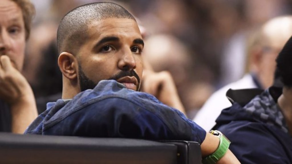 Drake Has Fiery Exchange with Cavaliers' Player Kendrick Perkins