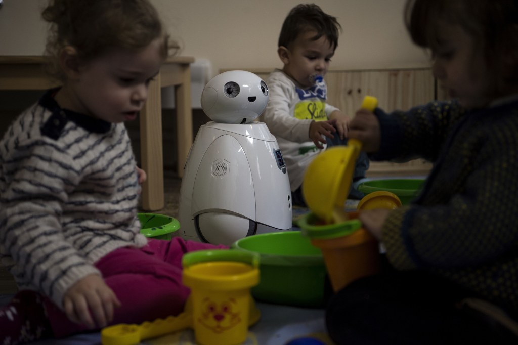 Children playing with robots - what does this mean for their