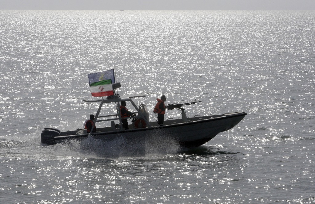 Iranian boats approached British tanker near Strait of Hormuz, officials say