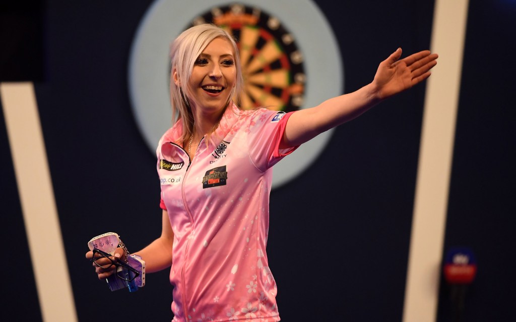 Female darts star beats a 2nd man at PDC World Championship