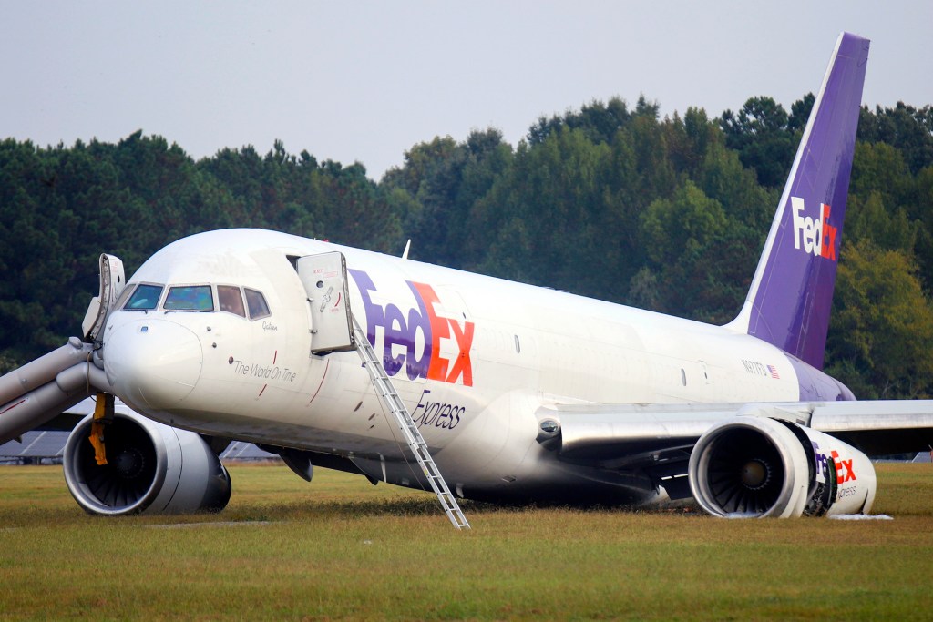 FedEx plane without landing gear skids off runway, but lands