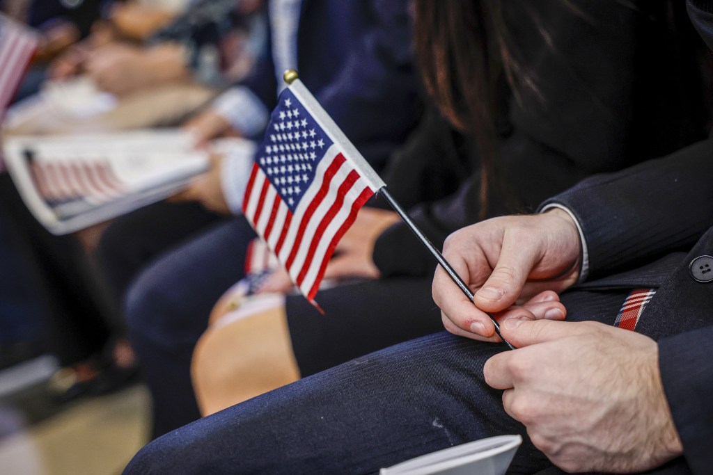 Agency that handles green cards and citizenship to hire armed agents who can make arrests