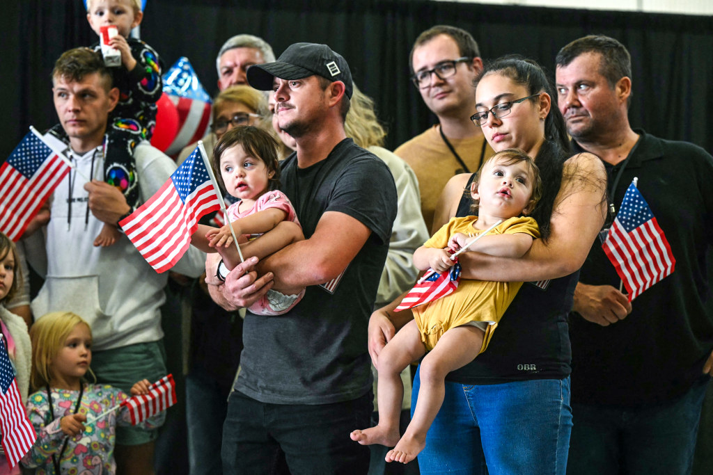 Trump administration welcomes 59 white South African refugees into the U.S.,  sparking political debate