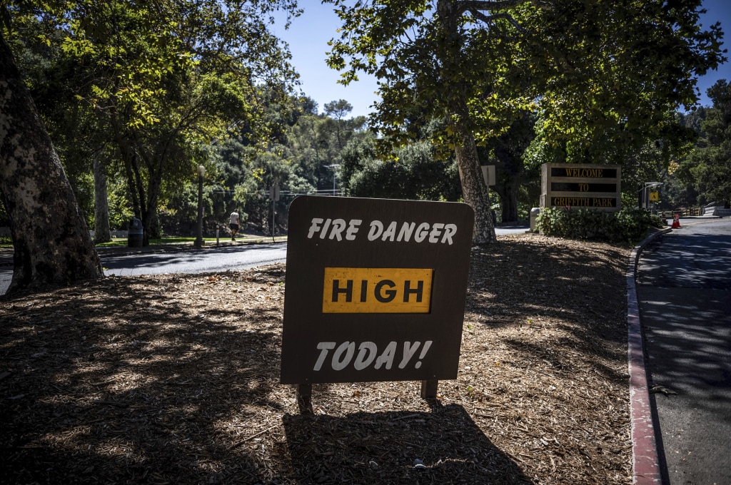 Dangerous heat and wildfire conditions take hold across the West