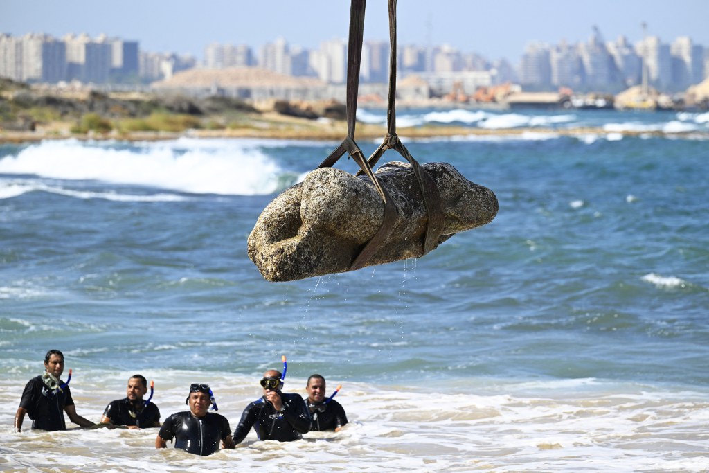 A sunken city's treasures are pulled from the depths after 2,000 years
