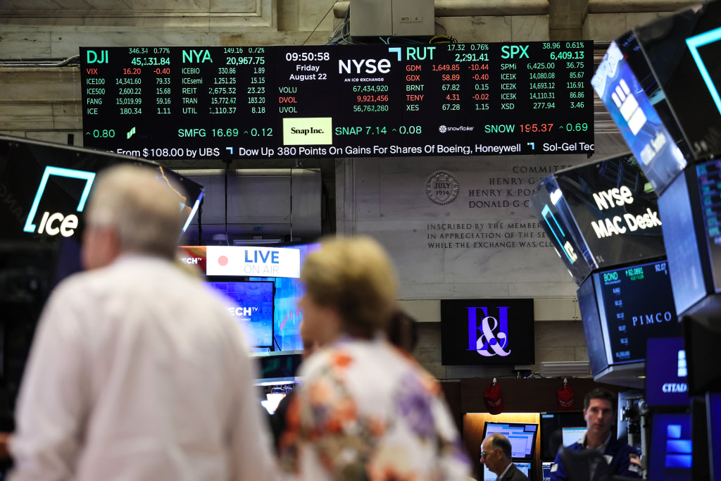 Stocks climb as investors bet on rate cut following Jerome Powell speech