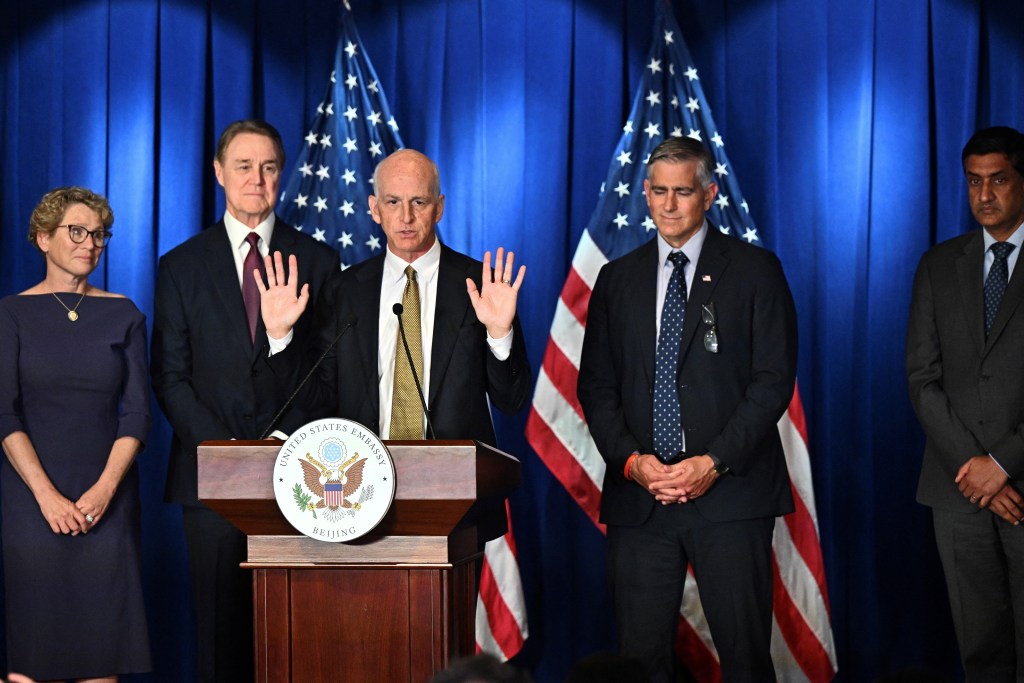 In rare visit to China, U.S. lawmakers urge better communication amid tensions