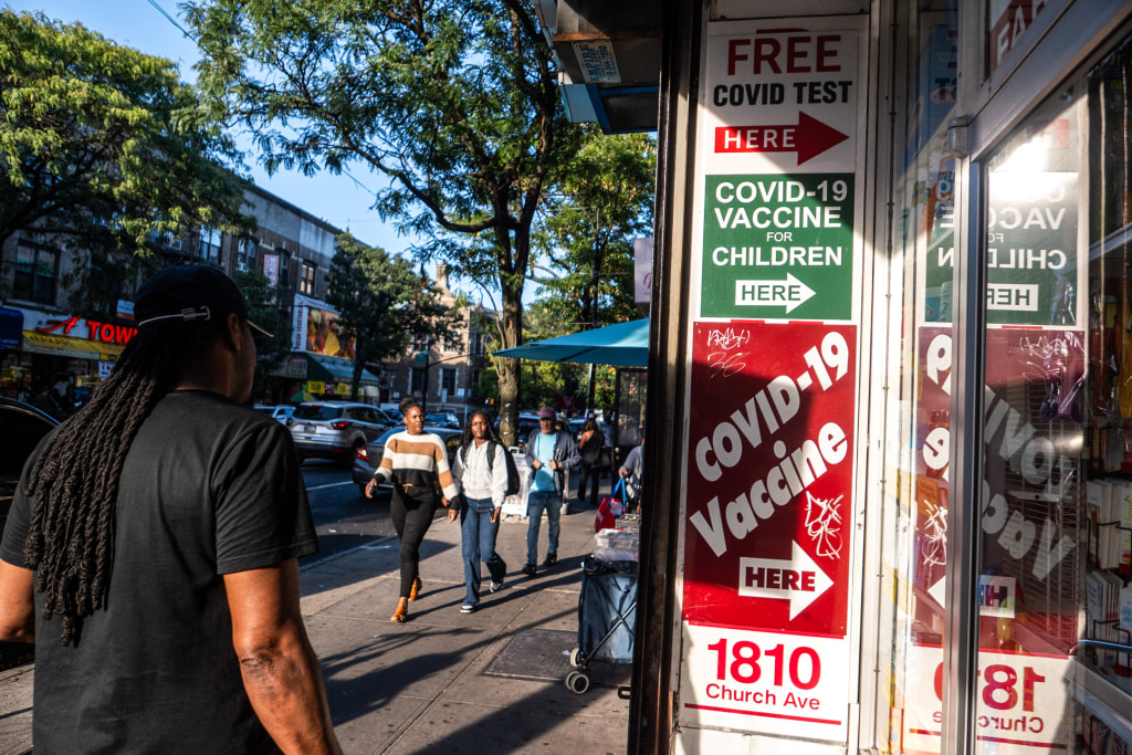 CDC panel votes to limit eligibility for this fall's Covid vaccines