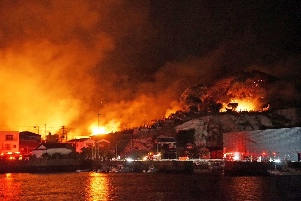 Fire burning in southwestern Japan damages 170 homes and forces
