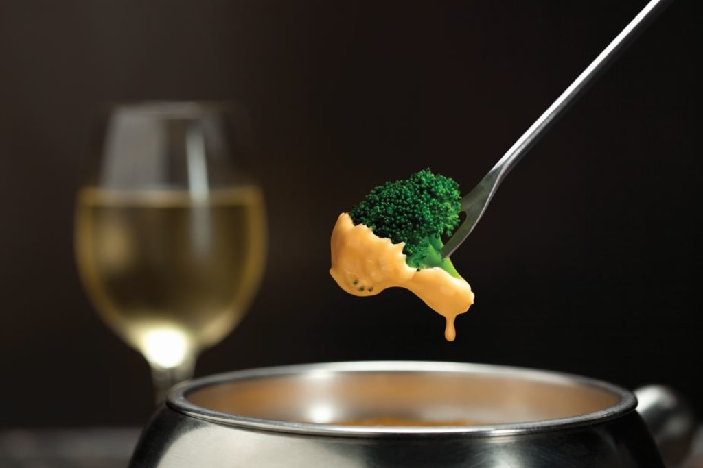 On Cheese Fondue Day Tips To Do The Dip Right 1 pound velveeta cheese 1 can cream of mushroom soup pinch of garlic salt (optional) 1 box frozen chopped broccoli, thawed. on cheese fondue day tips to do the