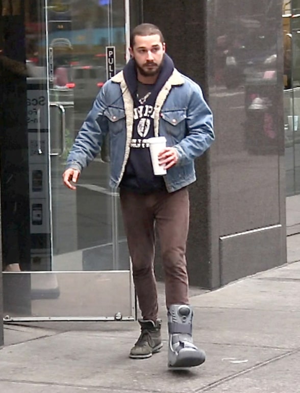 Shia LaBeouf limps around New York with walking boot for injured foot