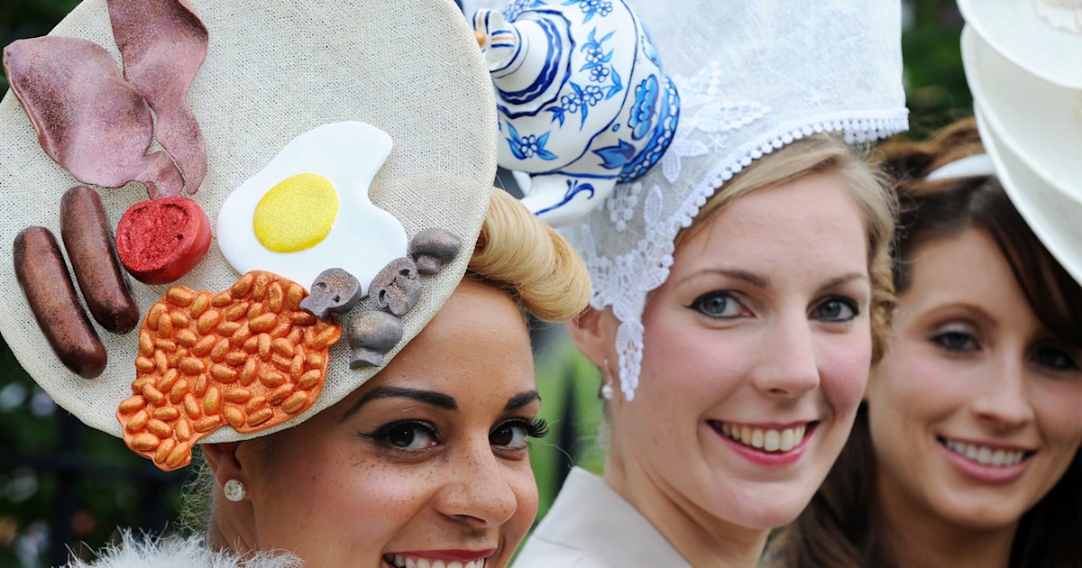 Pretty: A racegoer in a cheerful pink and green hat and form