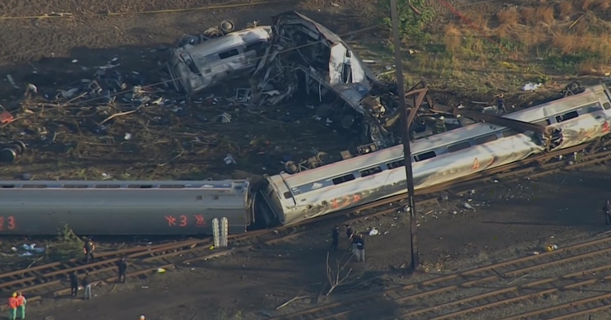 Investigators search for survivors in train crash