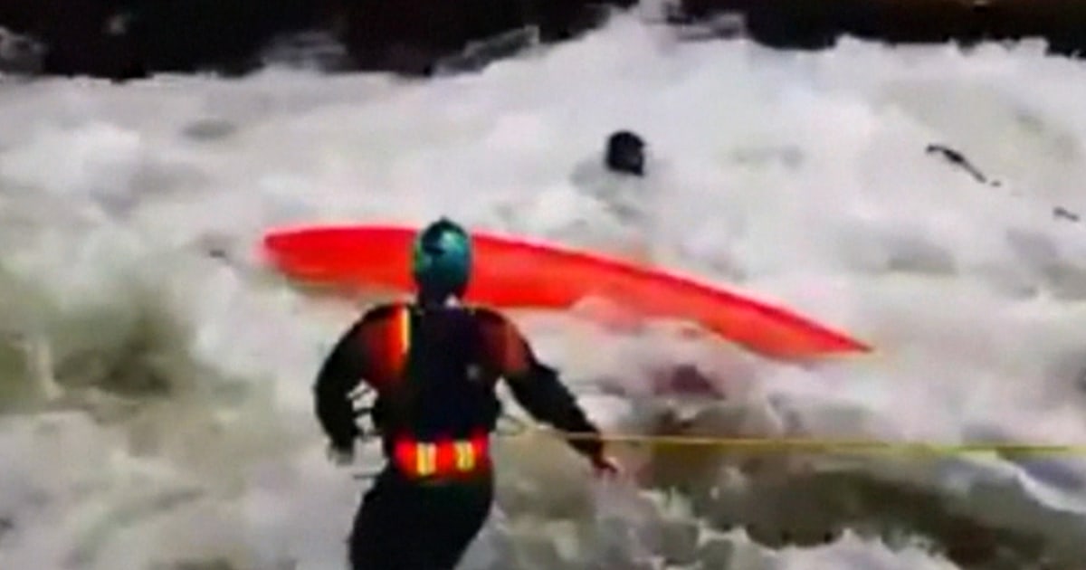 Caught on video: Rescuer leapfrogs boat to save injured kayaker