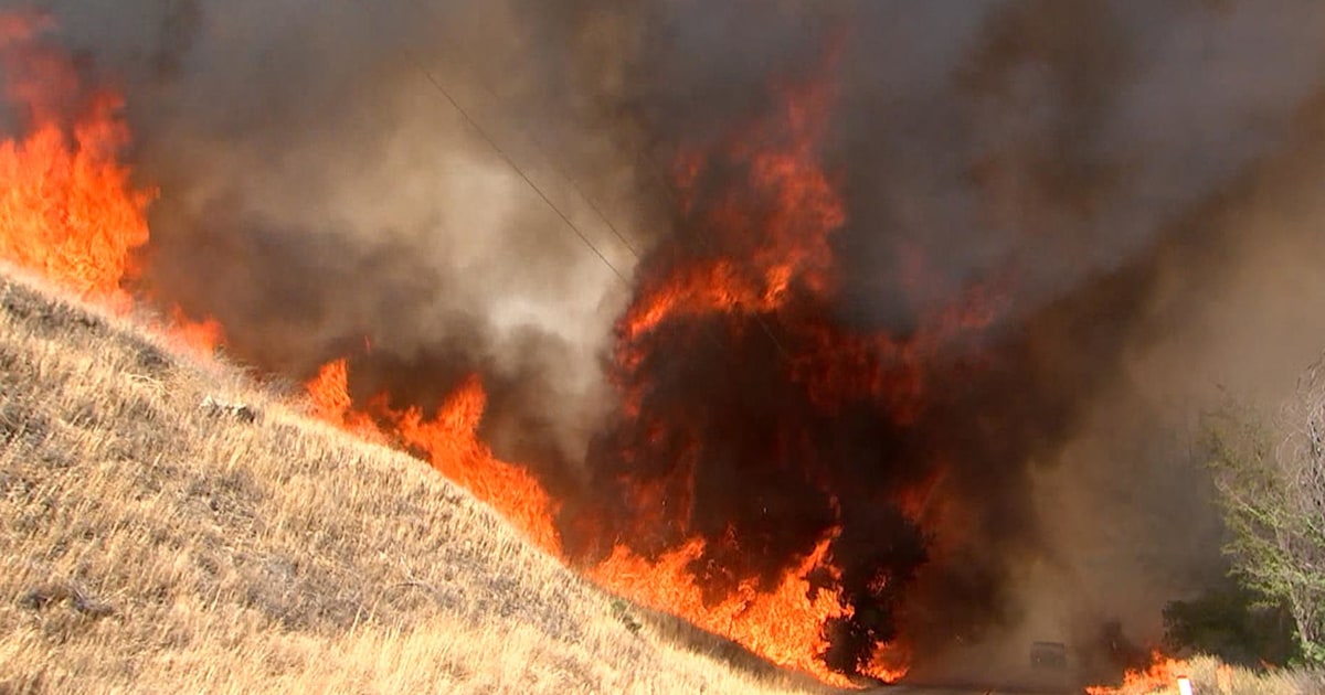 California wildfire rages on; some evacuees return home to heartbreak