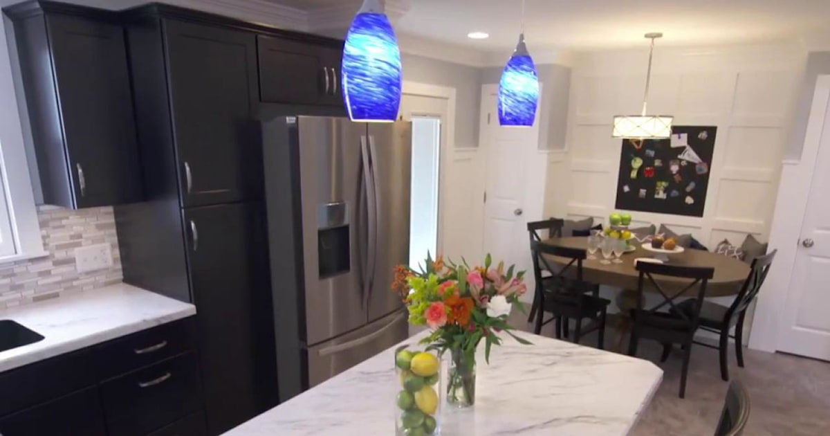 Watch this couple react to kitchen makeover of their dreams