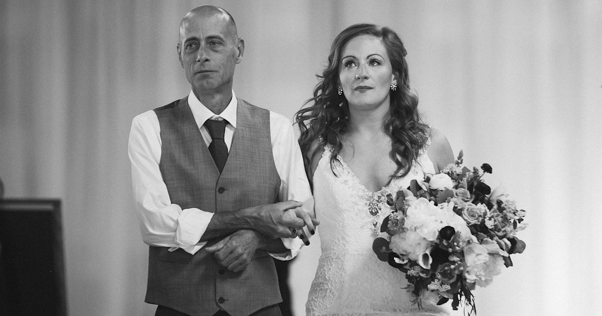 Emotional moment late dad’s best friend walks bride down aisle
