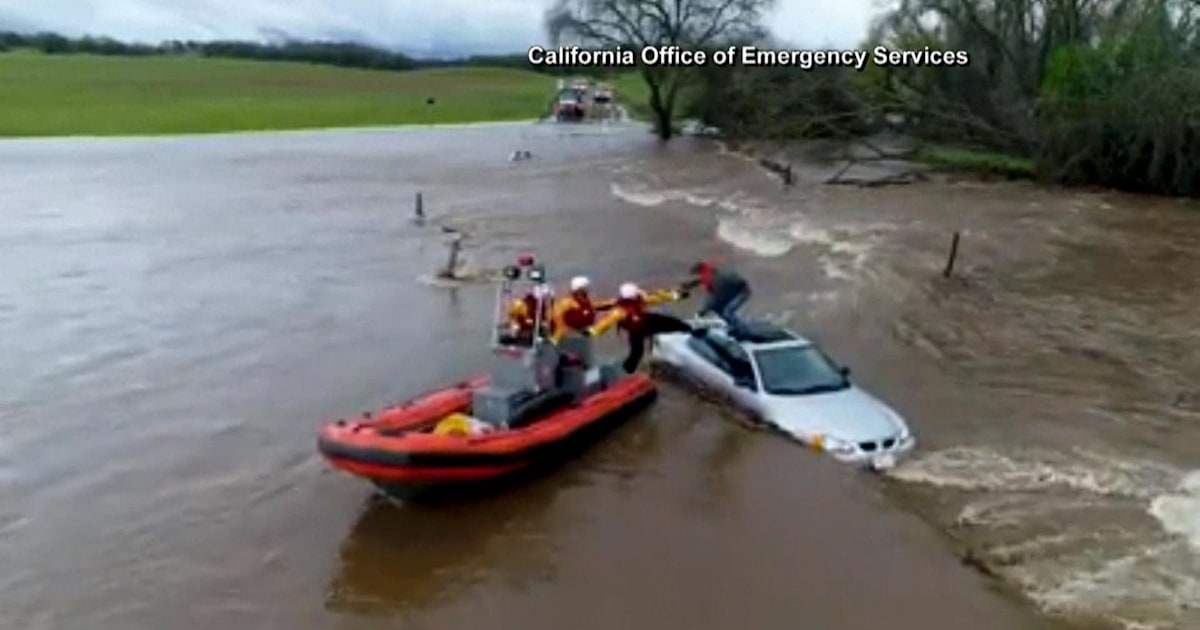 Driver pulled from car in flooded California creek in dramatic rescue