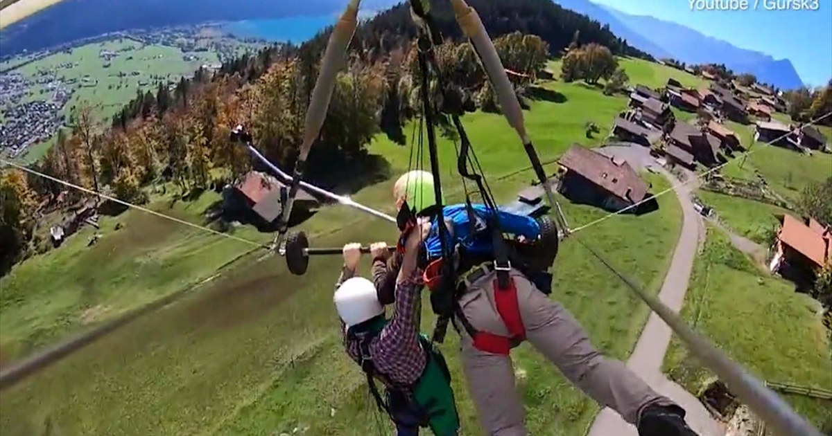Watch Hang glider holds on for dear life after realizing he’s not