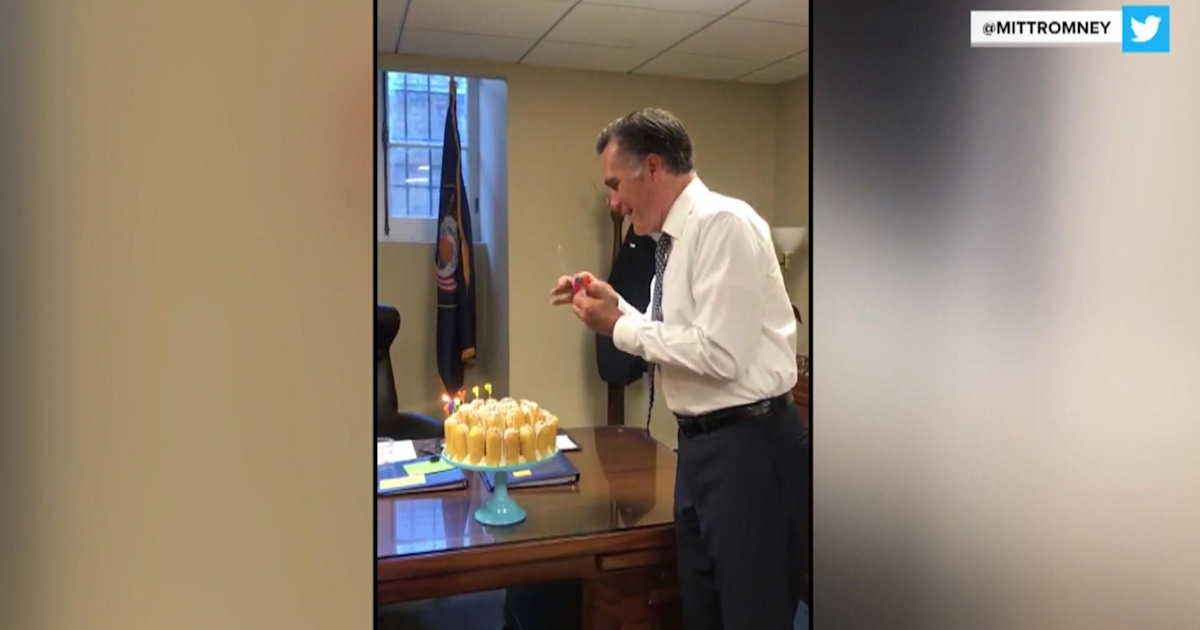 Mitt Romney has an interesting way of blowing out birthday candles