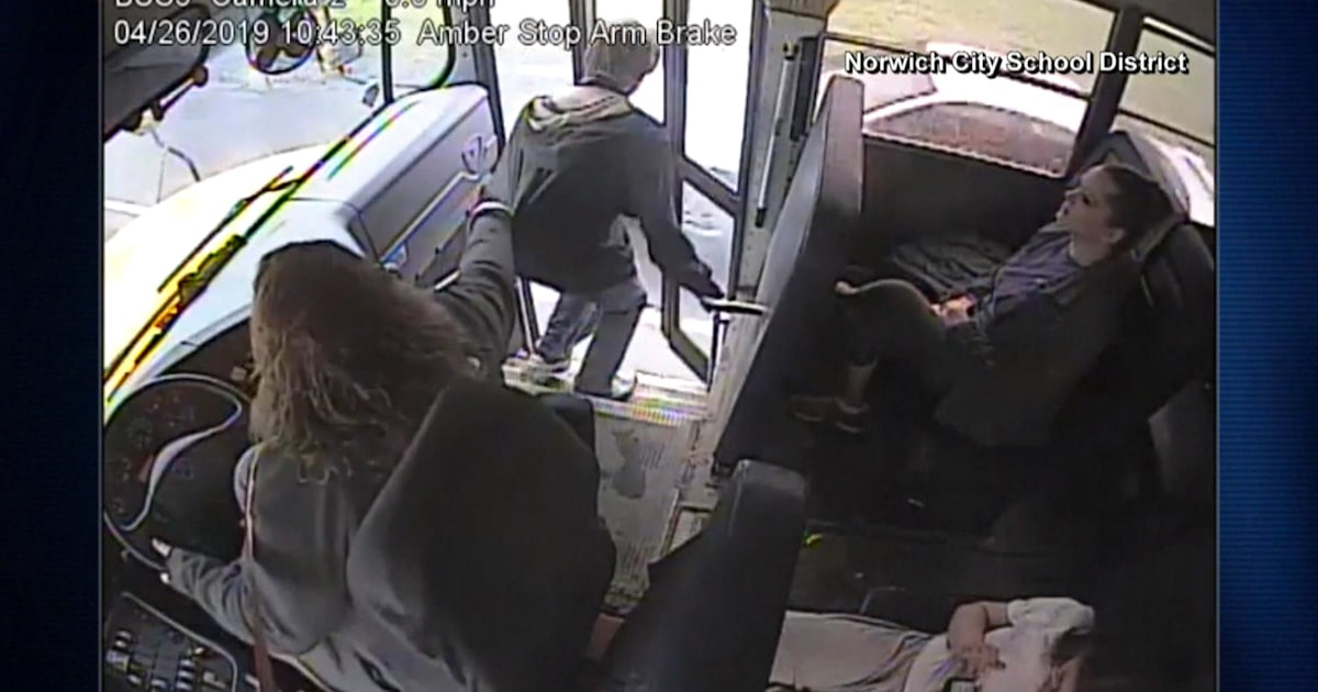 School bus driver stops boy from walking into path of speeding car