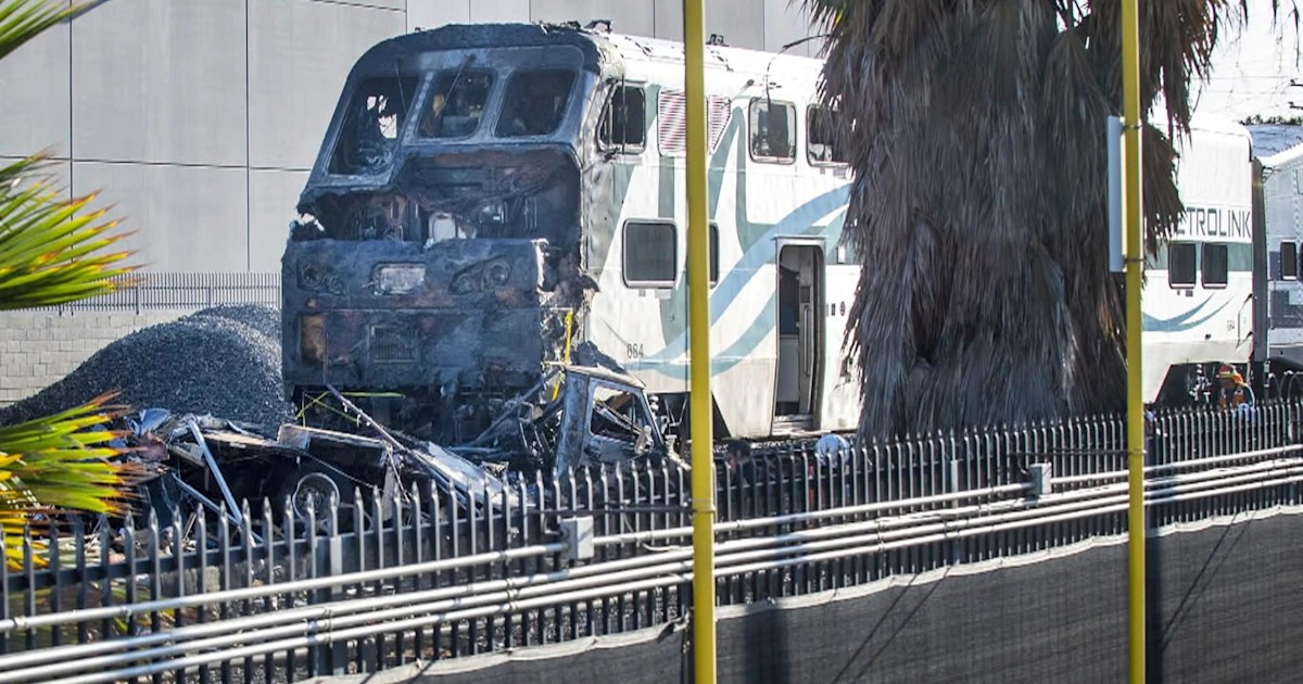 RV bursts into flames after getting hit by a train