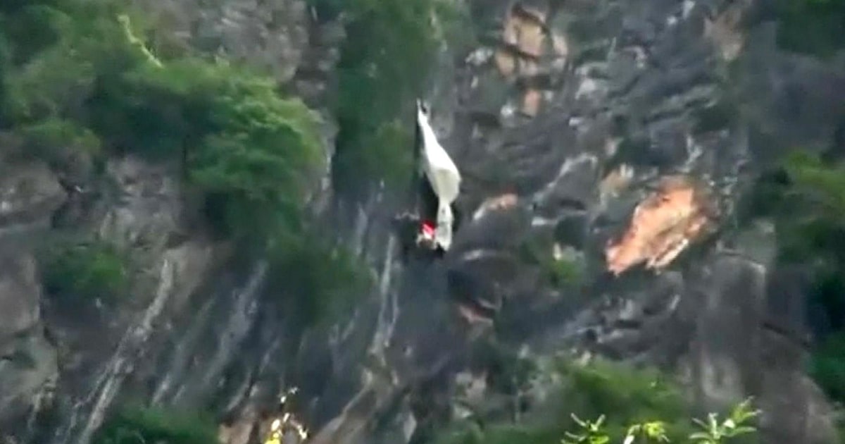 BASE jumper rescued after dangling from cliff for 6 hours