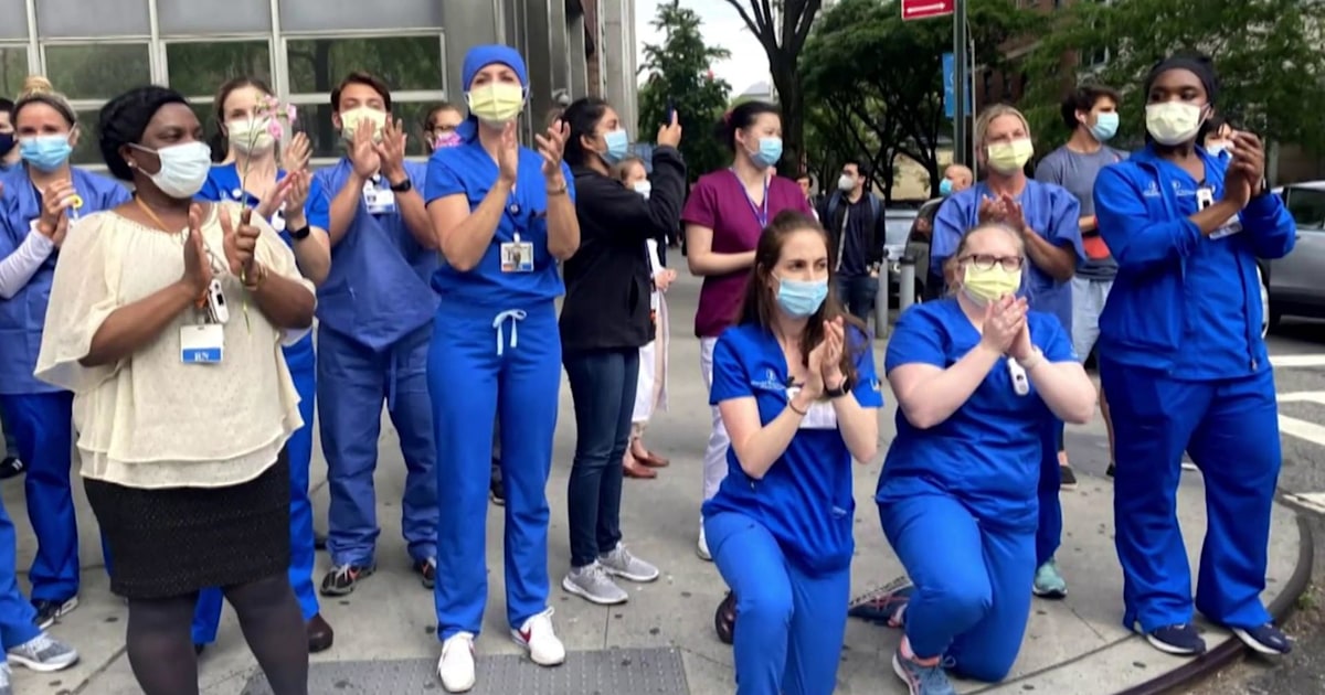 Health care workers applaud protesters in New York City
