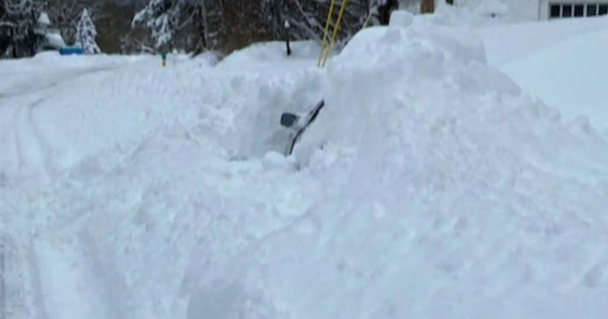 Man rescued after being trapped in car for 10 hours during snowstorm