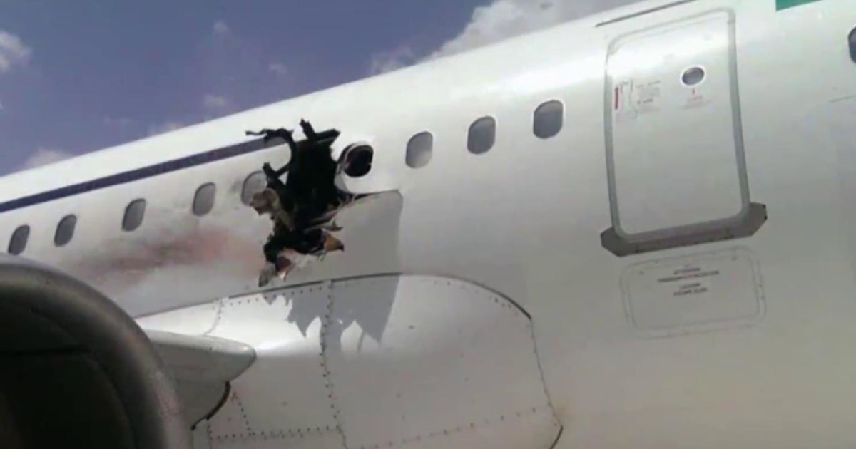 Mystery continues over cause of midair plane explosion