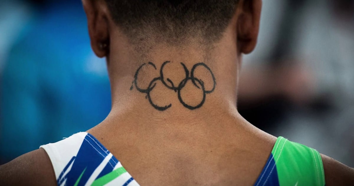 Hyeres, Var, France - April 18, 2015: Tattoos of the Olympic rings on a  foot stock photo - OFFSET