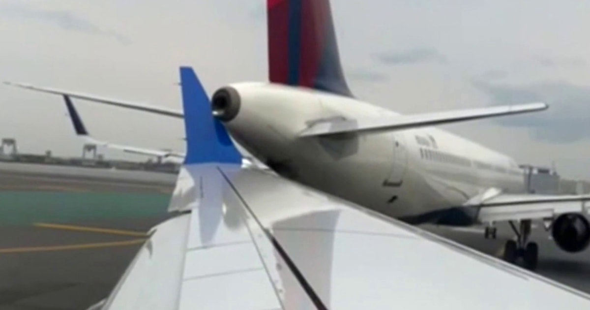 United flight’s wing collides with parked Delta plane’s tail