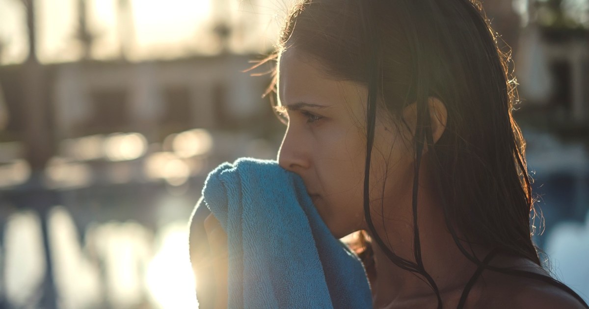 Should you rinse your hair before going in the pool?