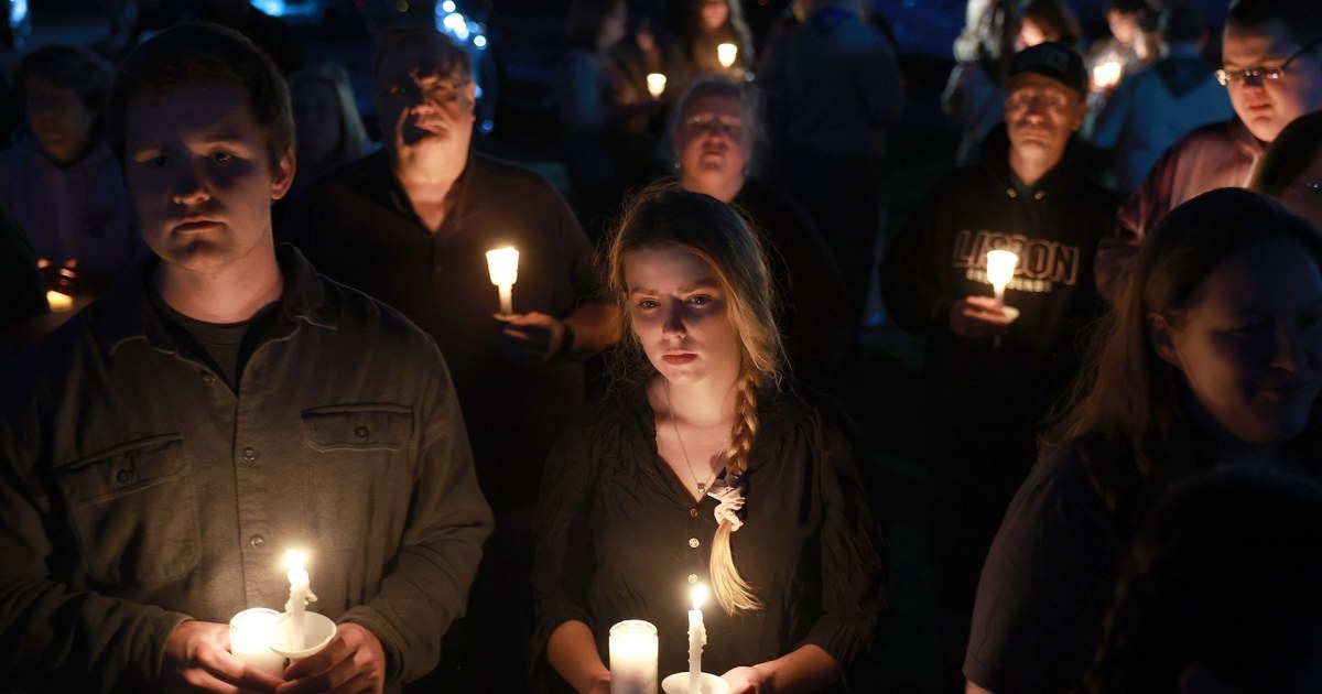 Mourners hold vigil for the 18 victims of Maine mass shooting