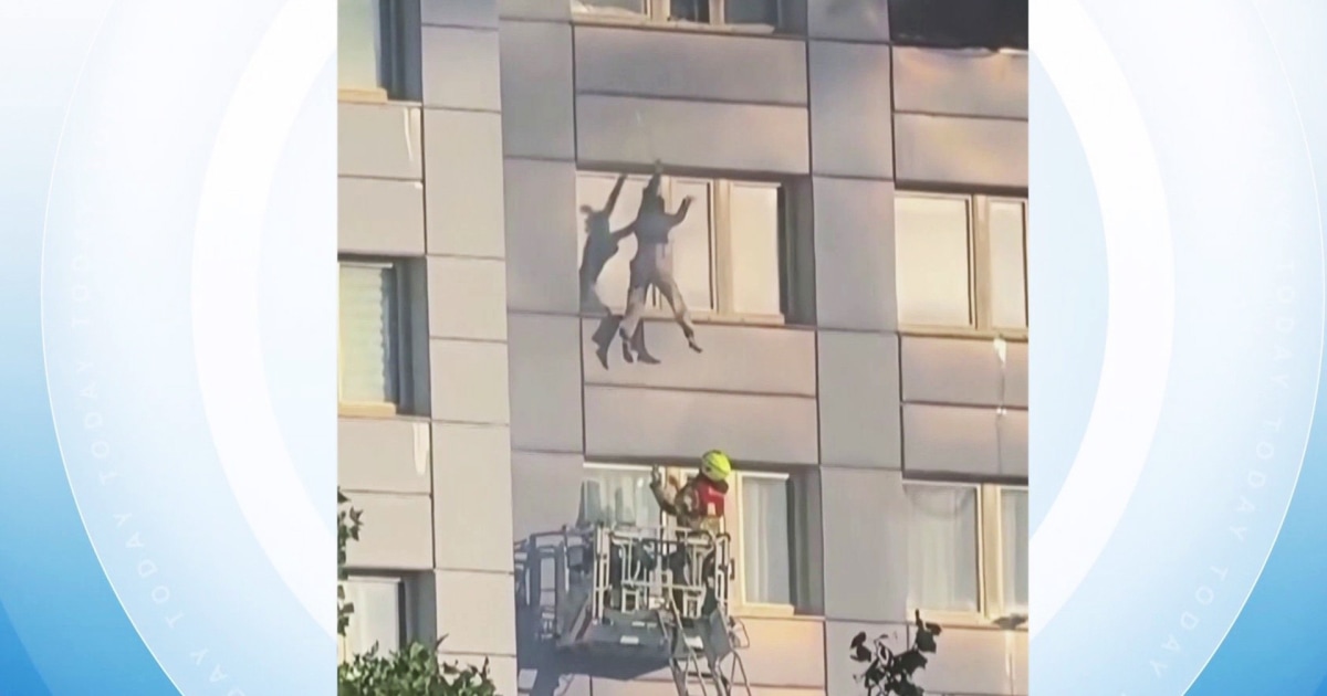 Woman Falls Into Firetruck Rescue Basket to Escape Building Fire