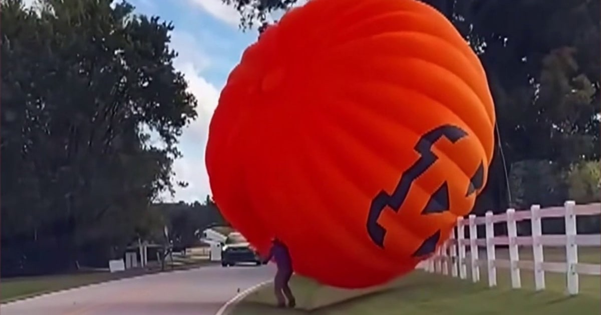 Inflatable Amphitheater Watch: Giant Inflatable Pumpkin Rolls Down North Carolina Road