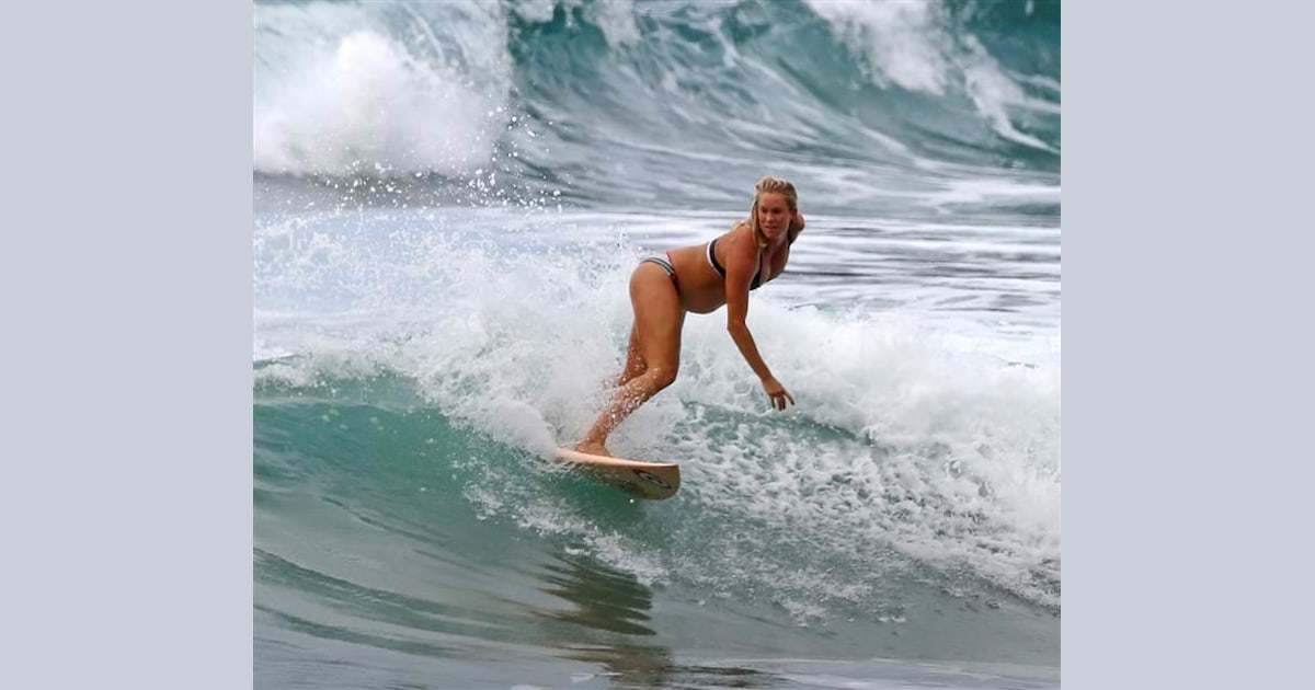 Pregnant Bethany Hamilton shows off baby bump while hitting the waves