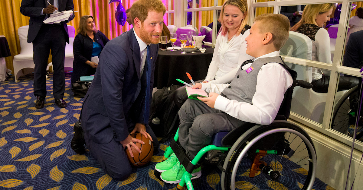 Prince Harry plays with 'bravest children in UK' at charity gala for
