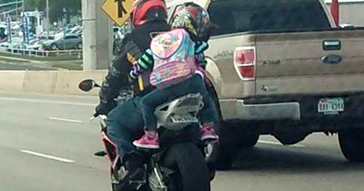 Kid riding motorcycle cheap with dad